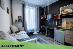 Apartamento pequeño con cocina y dormitorio en Les Apparts de Blossac Poitiers, en Poitiers