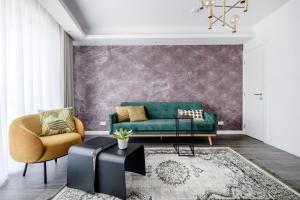 Zona d'estar a Million Sunsets Luxury Apartments