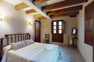 Posteľ alebo postele v izbe v ubytovaní Casa rural El Veredero