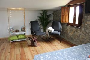 A seating area at El llagar - Sagasta Rural Oviedo