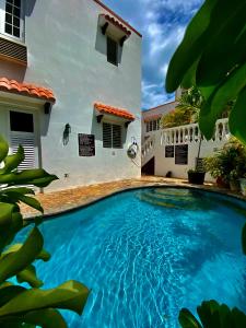 The swimming pool at or close to At Wind Chimes Boutique Hotel