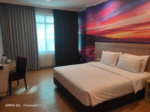 Postel nebo postele na pokoji v ubytování GiiA Sanno Hotel Pluit
