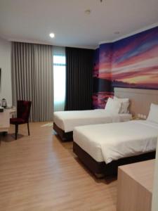 Postel nebo postele na pokoji v ubytování GiiA Sanno Hotel Pluit
