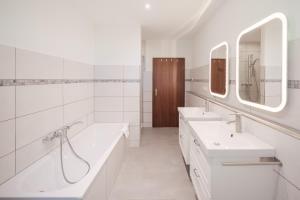 Koupelna v ubytování "Reetland" - Haus Hartwig + 37 fotografií