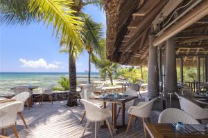 
A restaurant or other place to eat at Canonnier Beachcomber Golf Resort & Spa
