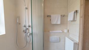 Koupelna v ubytování Hotel Lutter