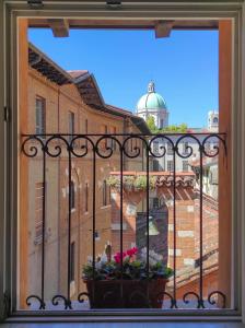 a window with a view of a building at B&B ai Musei in Brescia