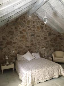 Postel nebo postele na pokoji v ubytování La Toscana de Corvo