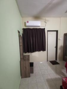 Fotografie z fotogalerie ubytování Cikgu Azue Homestay with lift 1floor security gate v destinaci Ampang