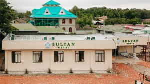 an aerial view of a building in a town at Sultan Kyzyl-Kia 