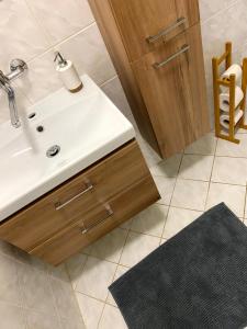 Koupelna v ubytování Apartmán Mladé Buky + 11 fotografií
