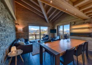 Posezení v ubytování Nendaz 4 Vallées & SPA 4* Superior