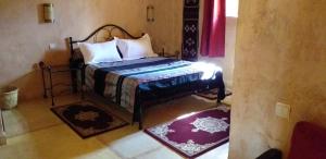 Postel nebo postele na pokoji v ubytování La Kasbah d'Ouzoud