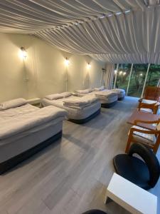 Letto o letti in una camera di Yun Ting Orchid Garden