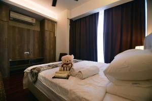 Postel nebo postele na pokoji v ubytování Cosy private suite 2BR 591 Nexus USJ Shah Alam + 29 fotografií