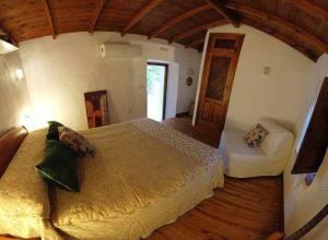 A bed or beds in a room at Molino de Simón