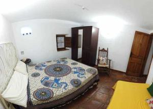 A bed or beds in a room at Molino de Simón