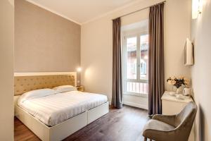 Cama ou camas em um quarto em Hotel San Silvestro