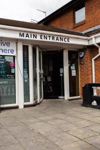 a main entrance to a main entrance of a building at Livingston Lodge Hotel in Livingston