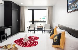 Posezení v ubytování Hoang Long Hotel Phan Thiết