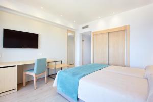 Кровать или кровати в номере Universal Hotel Cabo Blanco - Adults Only
