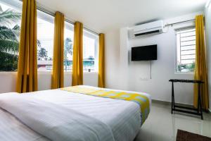 TV a/nebo společenská místnost v ubytování Flamingo Suites