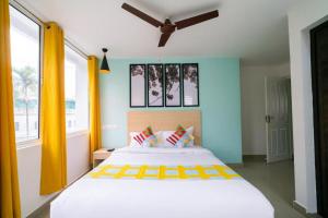 Voodi või voodid majutusasutuse Flamingo Suites toas