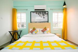 Voodi või voodid majutusasutuse Flamingo Suites toas
