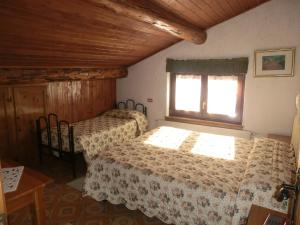 Posteľ alebo postele v izbe v ubytovaní Hotel Piccolo Mondo