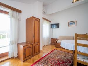 Postel nebo postele na pokoji v ubytování Apartment Fuma-5 by Interhome