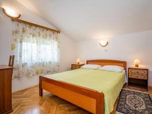 Postel nebo postele na pokoji v ubytování Apartment Fuma-5 by Interhome