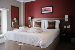 Posteľ alebo postele v izbe v ubytovaní The Portree Hotel