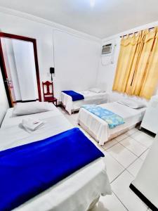 Postel nebo postele na pokoji v ubytování Hotel Sol e Mar
