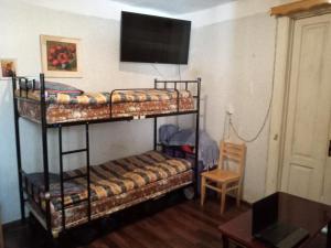 Giường trong phòng chung tại My Hostel and Cooking House!
