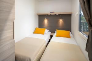 Posteľ alebo postele v izbe v ubytovaní Medora Orbis Mobile Homes & Glamping