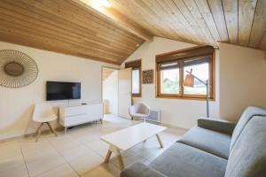Μια τηλεόραση ή/και κέντρο ψυχαγωγίας στο Residence Les Melezes - maeva Home