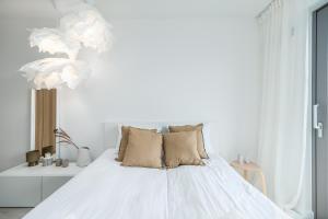Posteľ alebo postele v izbe v ubytovaní Apartment Balticus 19A by Noclegi Renters