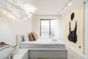 Posteľ alebo postele v izbe v ubytovaní Apartment Balticus 19A by Noclegi Renters
