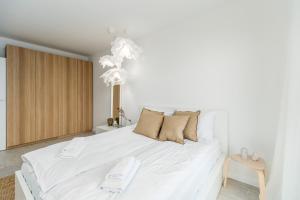Posteľ alebo postele v izbe v ubytovaní Apartment Balticus 19A by Noclegi Renters
