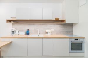 Kuchyňa alebo kuchynka v ubytovaní Apartment Balticus 19A by Noclegi Renters
