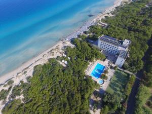 an aerial view of a resort next to the beach at Ecoresort Le Sirene - Caroli Hotels in Gallipoli