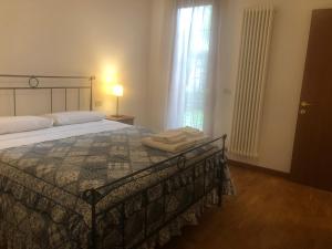 Postel nebo postele na pokoji v ubytování Vecchia Filanda