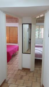 A bed or beds in a room at vacanze nella natura con vista mare