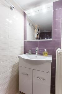 Koupelna v ubytování Peonios Apartment