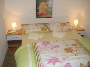 Postelja oz. postelje v sobi nastanitve Apartments Dalmacija