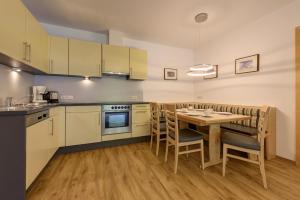 Virtuvė arba virtuvėlė apgyvendinimo įstaigoje Apart La Vita