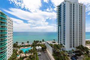 an aerial view of a building and the ocean at The Tides Ocean Luxury Suites in Hollywood +59 photos