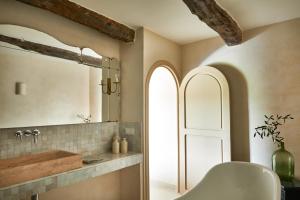 A bathroom at Luxury townhouse in the heart of medieval St Paul de Vence