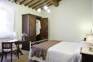 Postel nebo postele na pokoji v ubytování Agriturismo L'Incrociata