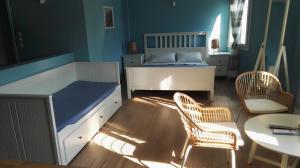 A bed or beds in a room at Porto Gavrio Loft